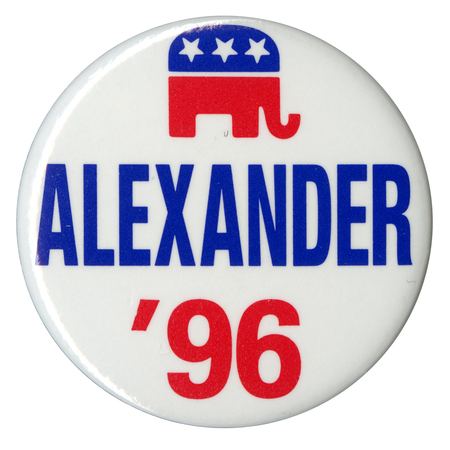 Round, white button with a red and blue GOP elephant symbol and blue and red text reading "ALEXANDER '96"