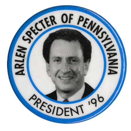 Round, white button with a blue border and a black and white photograph of Arlen Specter in the center. Black text reads "ARLEN SPECTER OF PENNSYLVANIA PRESIDENT '96"