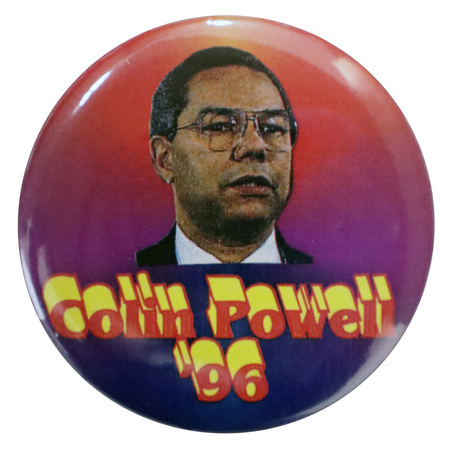Round button with a yellow, red, and purple background featuring a color photograph of Colin Powell. Yellow and red text reads "Colin Powell '96"