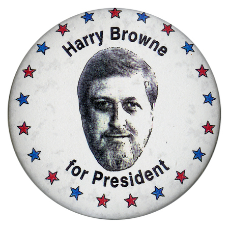 Round, white button with red and blue stars along the edge. In the center is a black and white photograph of Harry Browne. Black text reads "Harry Browne for President"