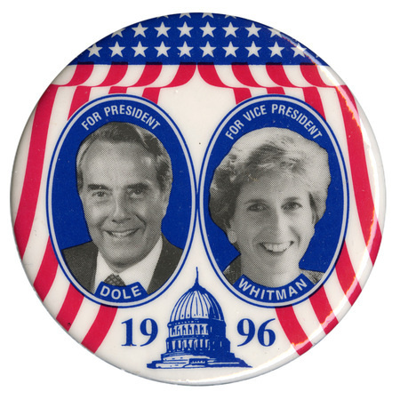 Round button with red, white, and blue stars and stripes decorations and a blue illustration of the US Capitol. Inside two blue circles are black and white photographs of Bob Dole and Christine Todd Whitman. White and blue text reads "FOR PRESIDENT DOLE FOR VICE PRESIDENT WHITMAN 1996"