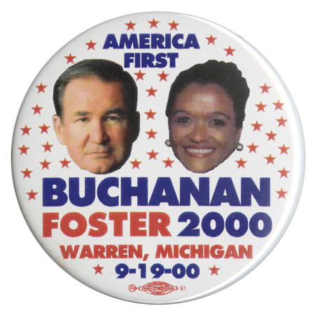Round button with red stars on a white background and color photographs of Pat Buchanan and Ezola Foster. Blue and red text reads "AMERICA FIRST BUCHANAN FOSTER 2000 WARREN, MICHIGAN 9-19-00"