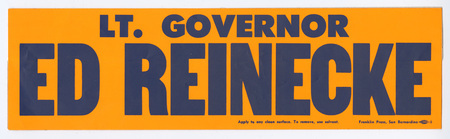 Rectangular, yellow bumper sticker with blue text reading "LT. GOVERNOR ED REINECKE"