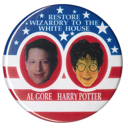 Round button with a background of red, white, and blue stars and stripes. In the center are a color photograph of Al Gore and a color illustration of Harry Potter. White text reads "RESTORE WIZARDRY TO THE WHITE HOUSE AL GORE HARRY POTTER"