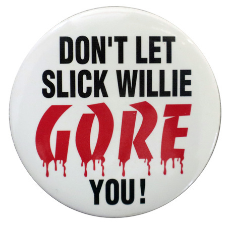 Round, white button with black and red text reading "DON'T LET SLICK WILLIE GORE YOU!"