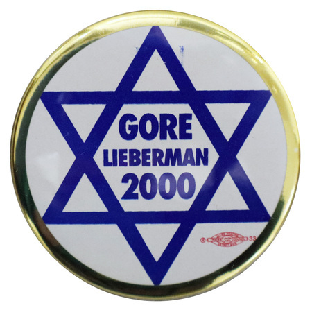Round, white button with a gold border and a blue Star of David. Blue text reads "GORE LIEBERMAN 2000"