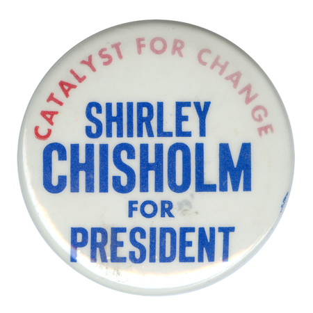 Round, white button with red and blue text reading "CATALYST FOR CHANGE SHIRLEY CHISHOLM FOR PRESIDENT"