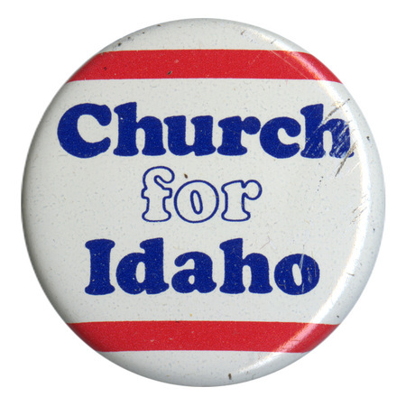 Round, white button with horizontal red stripes and blue and white text reading "Church for Idaho"