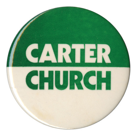 Round, green and white button with white and green text reading "CARTER CHURCH"