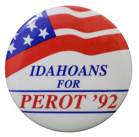 Round, white button with a red, white, and blue US flag illustration along the top. Blue and red text reads "IDAHOANS FOR PEROT '92"