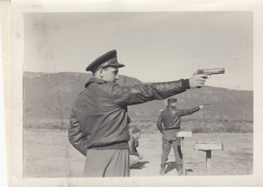 Photograph of Calnon receiving officer pistol training.