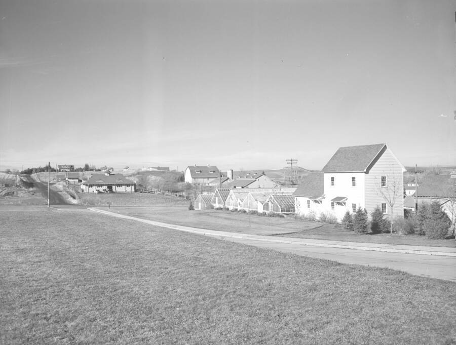 1945 panoramic photograph of University farms. Northeast view of the greenhouses. [PG1_001-11]