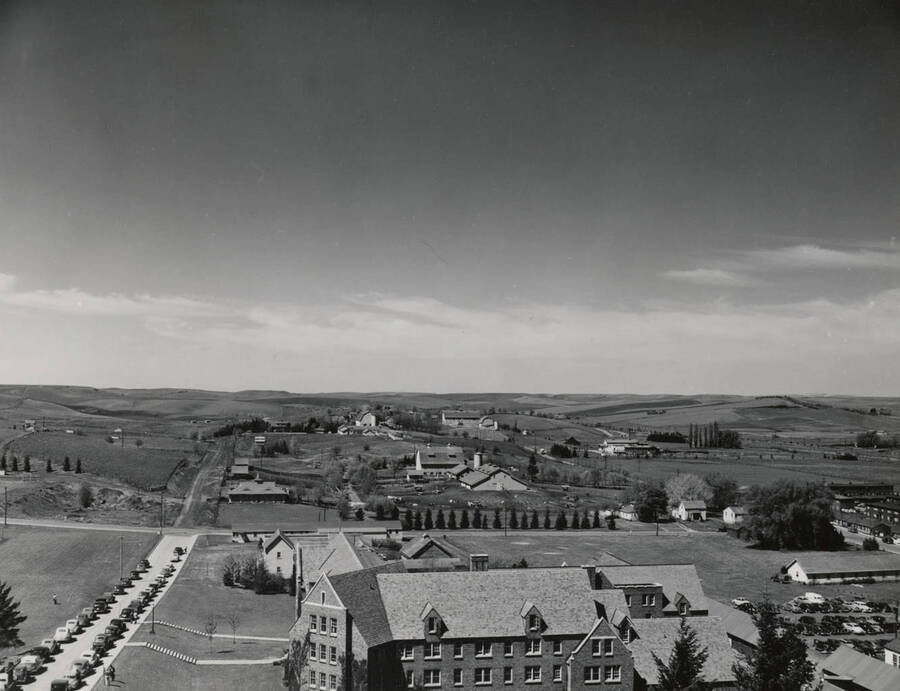 1941 panoramic photograph of University farms. View looking east with Brink Hall in the foreground. [PG1_001-04]`