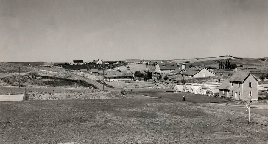 1933 panoramic photograph of University farms. Tennis courts are to the left. [PG1_001-08]