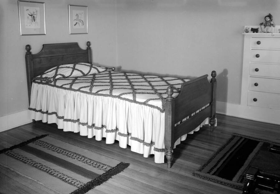 1945 photograph of the Home Management House. View of a bedroom. [PG1_106-08]