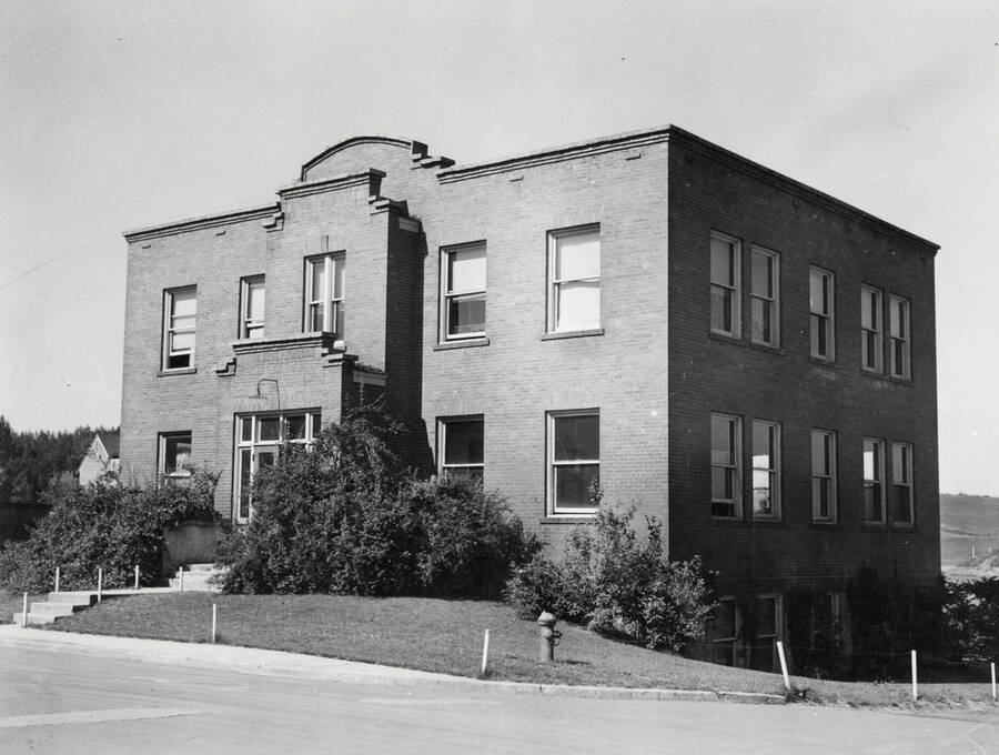 1936 photograph of Dairy Science Building. Fire hydrant in foreground. [PG1_108-01]