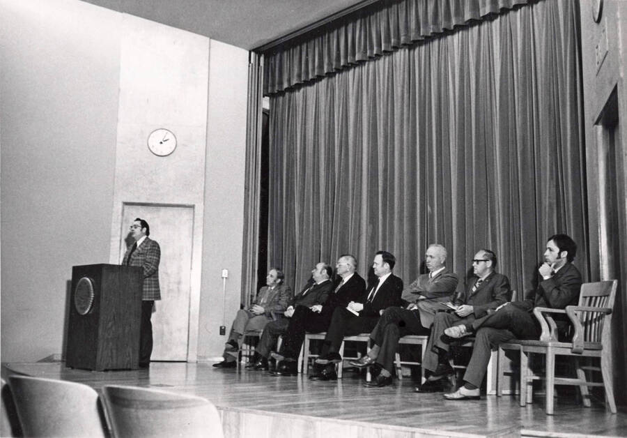 1974 photograph of Agricultural Science Building. Dean Mullins at lectern. [PG1_111-10]