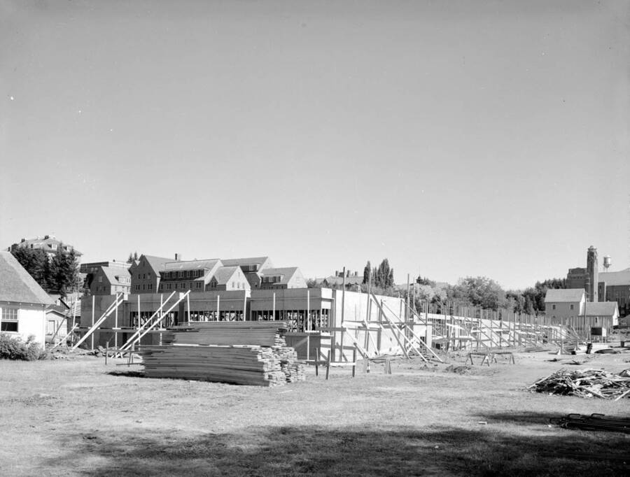 July 10, 1949 photograph of the Agricultural Science Building under construction. Memorial gym in background. [PG1_111-16d]