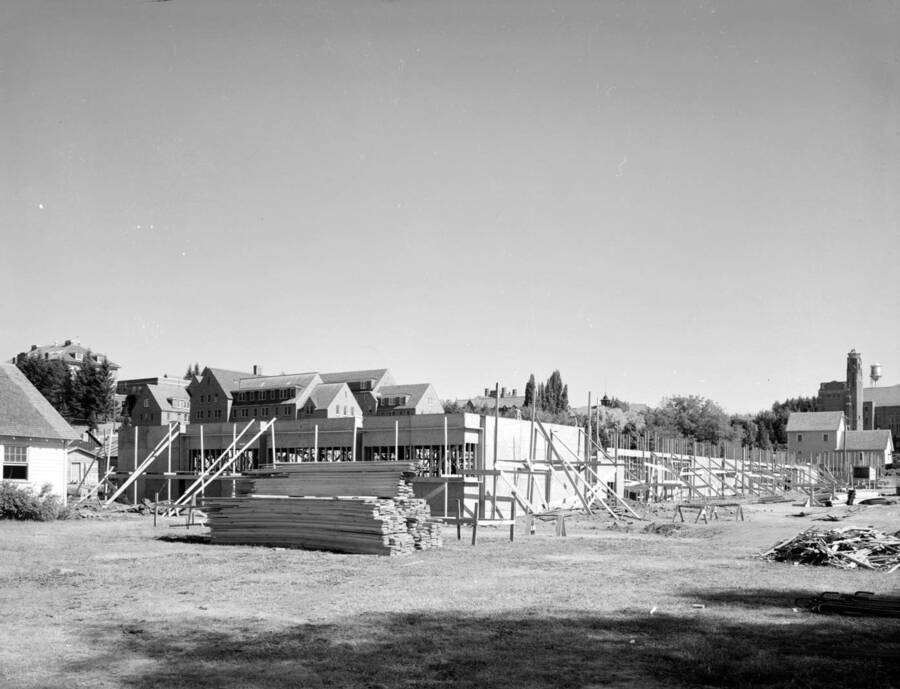 July 10, 1949 photograph of the Agricultural Science Building under construction. Memorial gym in background. [PG1_111-16e]