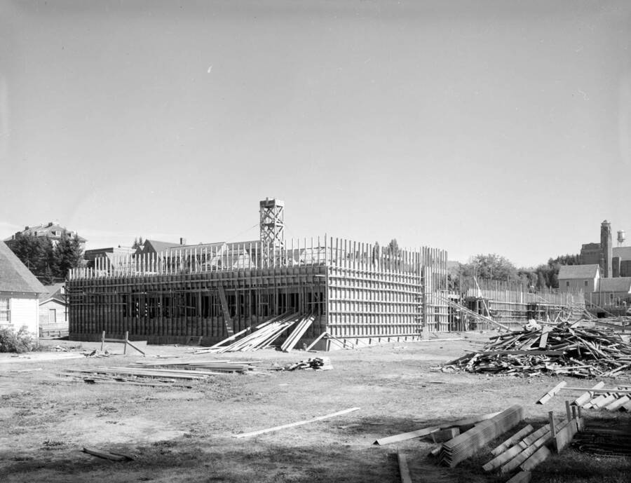August 10, 1949 photograph of the Agricultural Science Building under construction. Memorial gym in background. [PG1_111-17a]