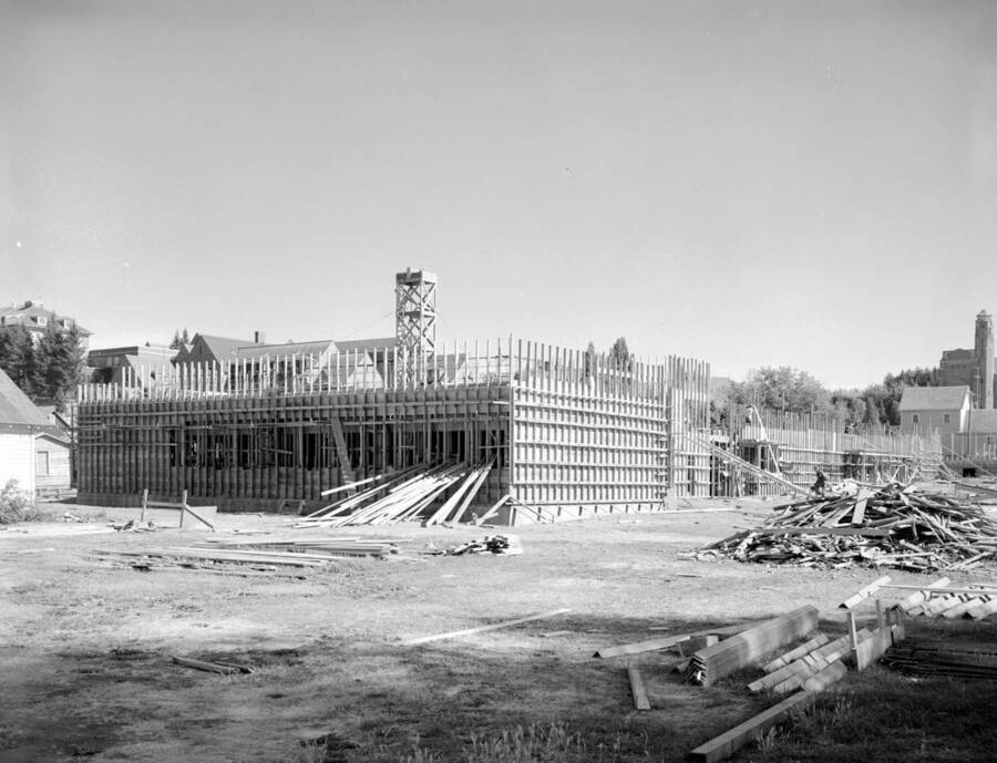 August 10, 1949 photograph of the Agricultural Science Building under construction. Memorial gym in background. . [PG1_111-17b]