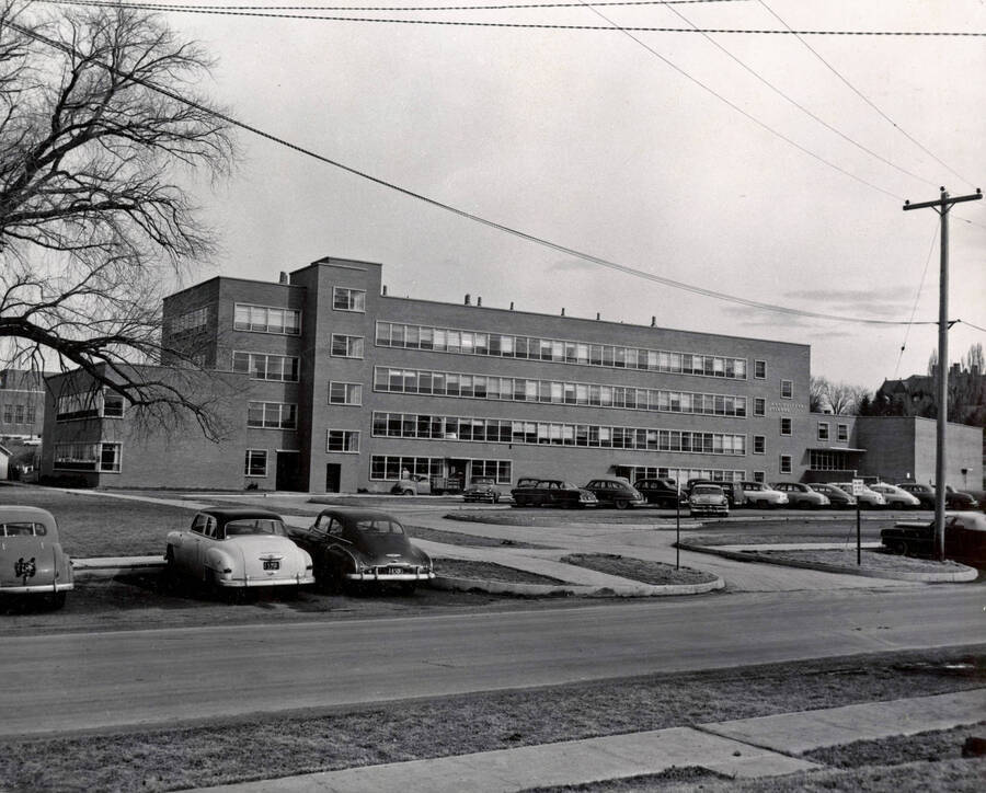 1955 photograph of Agricultural Science Building. Automobiles in foreground. Donor: Publications Dept.. [PG1_111-08]