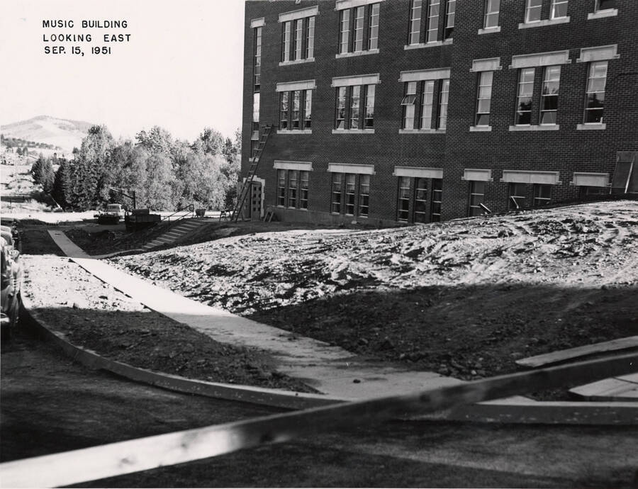 September 15, 1951 photograph of the Music Building under construction. Trees in background. [PG1_117-28a]