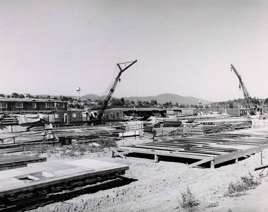 1946 photograph of Veterans Housing on West Sixth under construction. Water tower in background. [PG1_120-02]