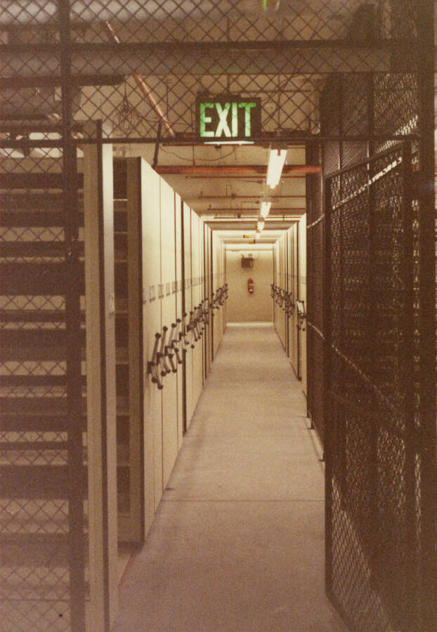 December 15, 1988 photograph of the Library. Compact shelving in basement. Donor: Monte Steiger. [PG1_122-105d]