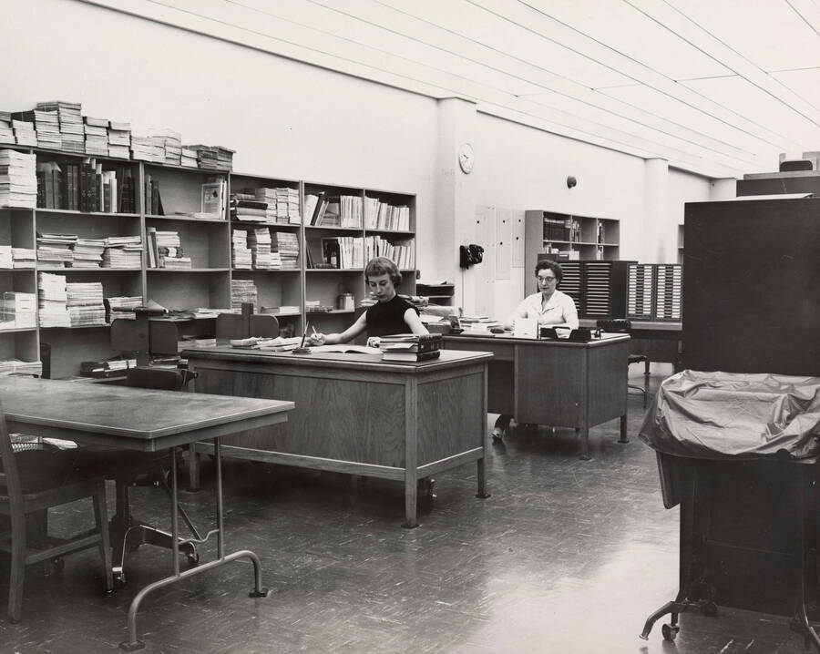 1957 photograph of the Library. Technical services department. [PG1_122-013]