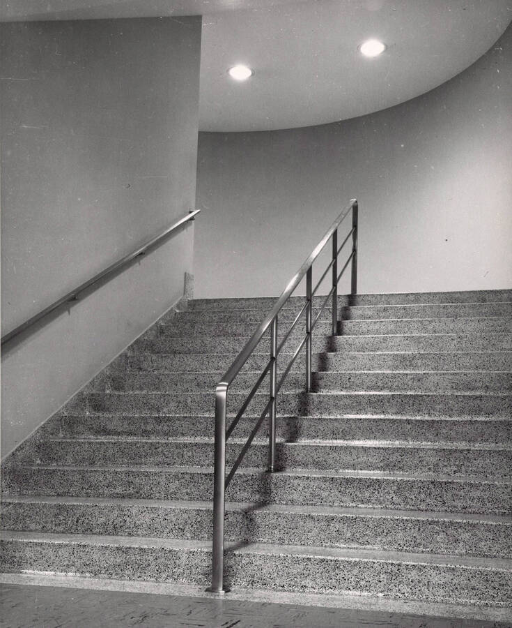 1957 photograph of the Library. Stairwell with center handrail. [PG1_122-025]