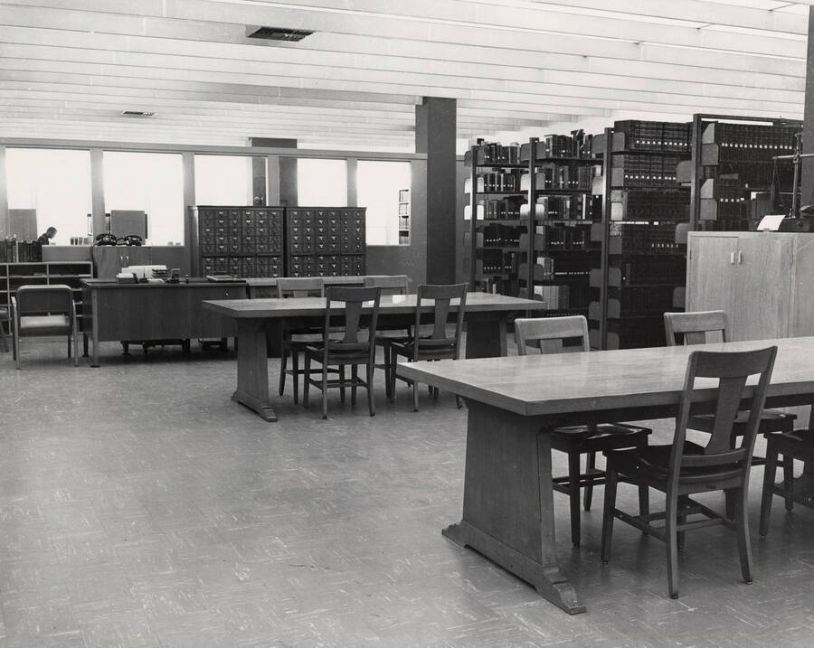 1957 photograph of the Library. Special Collections. Tables in foreground, card catalog in background. [PG1_122-047]