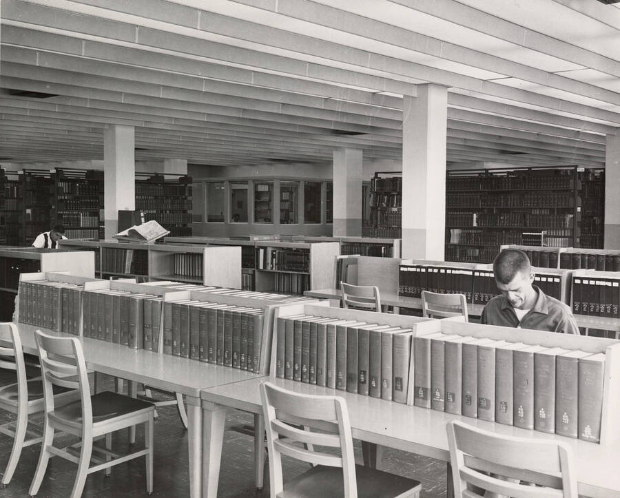 1957 photograph of the Library. Student studies at the right. [PG1_122-056]
