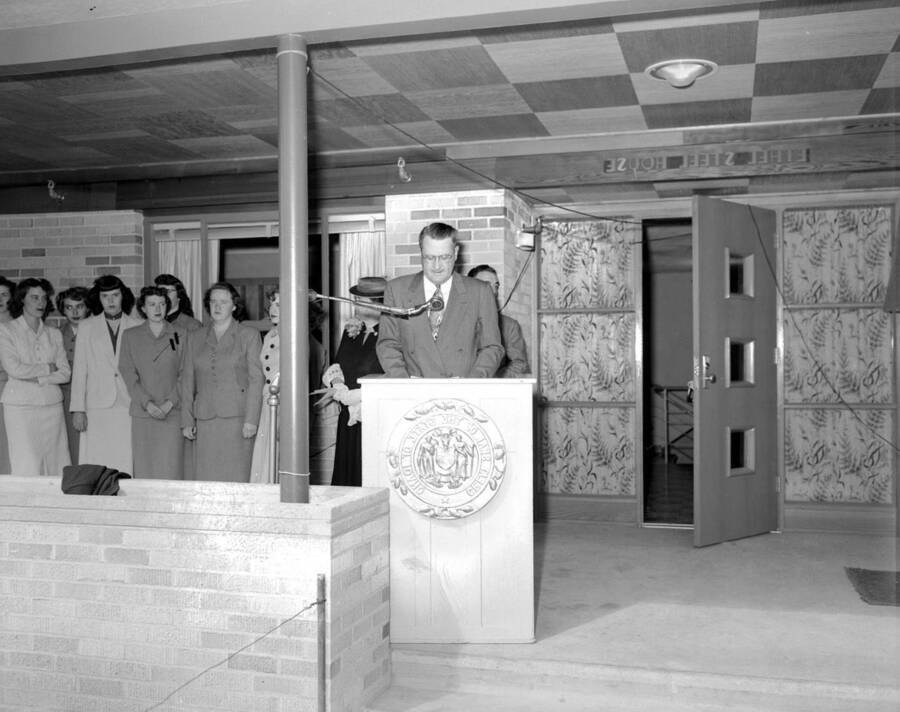 1953 photograph of the Ethel Steel House. President Buchanan at lectern. [PG1_124-03]