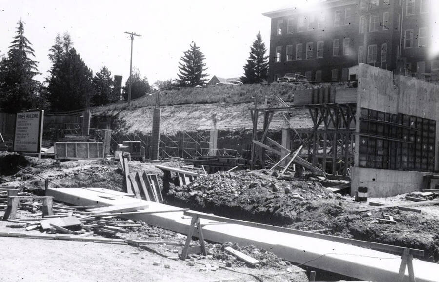 1960 photograph of the Mines Building under construction. Donor: College of Mines. Automobiles in background. [PG1_125-04]