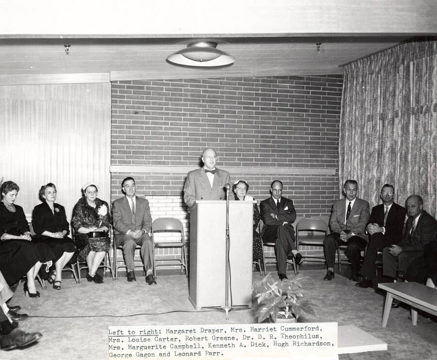 1954 photograph of the Permeal J French House dedication ceremony. Left to right: Margaret Draper, Harriet Cummerford, Louise Carter, Robert Greene, D.R. Theophilus, Marguerite Campbell, Kenneth A. Dick, Hugh Richardson, George Gagon, Leonard Parr. [PG1_126-03]