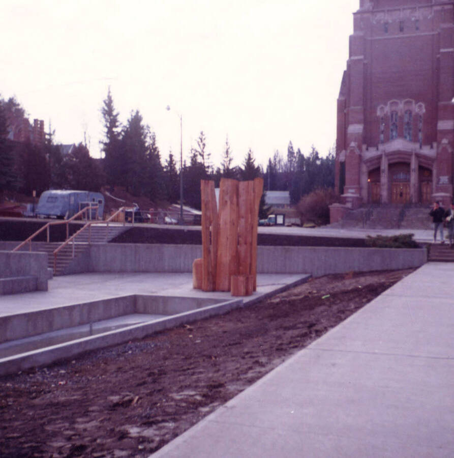 1965 photograph of the Library Plaza. Memorial Gym in background. Donor: Charles A. Webbert. [PG1_128-07]