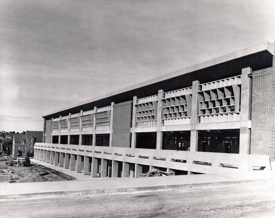 1965 photograph of the University Classroom Center under construction. Automobile in background. [PG1_128-09]