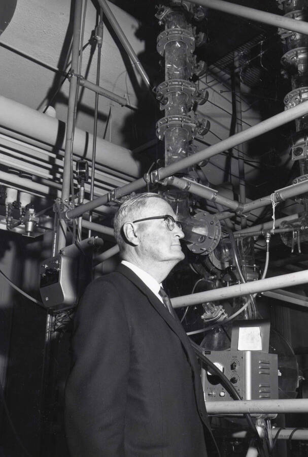 1969 photograph of the Buchanan Engineering Laboratory dedication ceremony. J.E. Buchanan inspects equipment. [PG1_137-07]