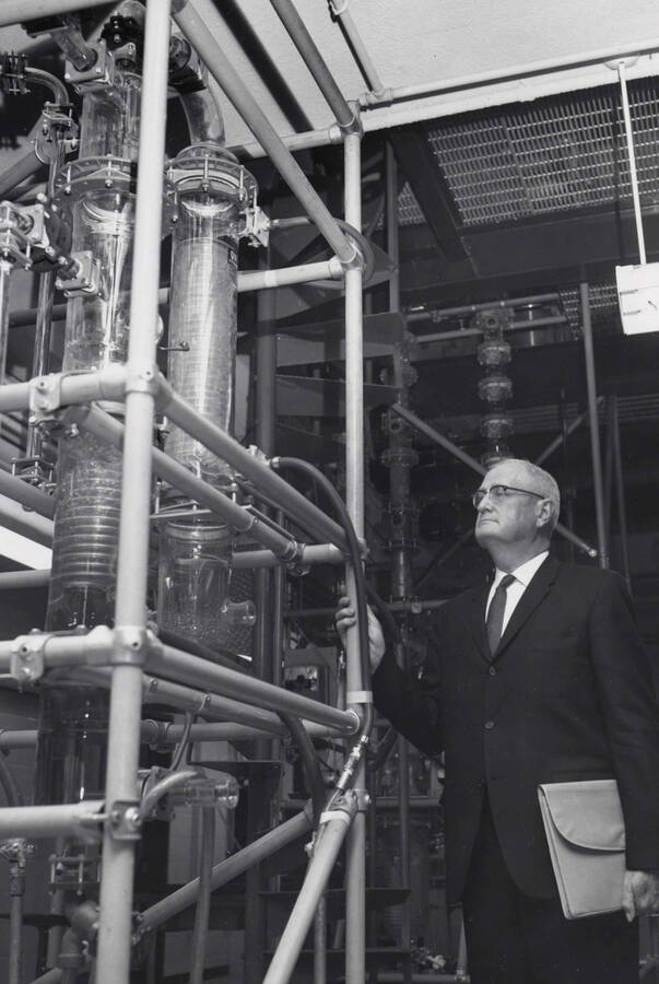 1969 photograph of the Buchanan Engineering Laboratory dedication ceremony. J.E. Buchanan inspects equipment. [PG1_137-08]