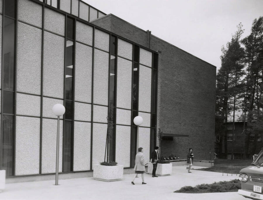 1962 photograph of the Education Building. Students in foreground. [PG1_139-11]