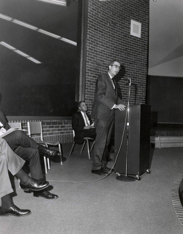 1969 photograph of the Education Building dedication ceremony. Dean Samuelson at lectern. Donor: Publications Dept. [PG1_139-04]