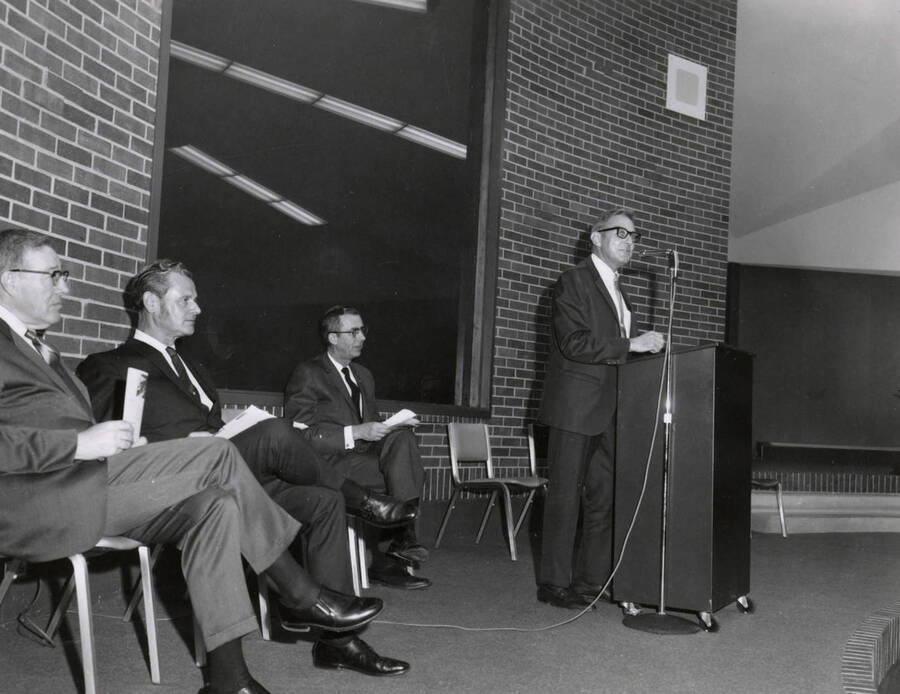 1969 photograph of the Education Building dedication ceremony. President Hartung at lectern. Donor: Publications Dept. [PG1_139-05]