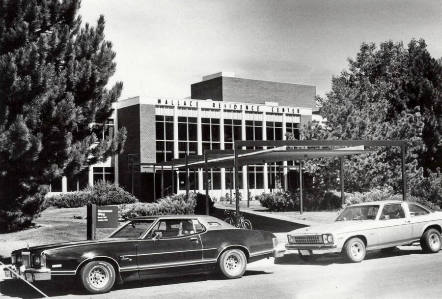 1970 photograph of the south entrance of the Wallace Residence Center. Automobiles in foreground. [PG1_141-15]