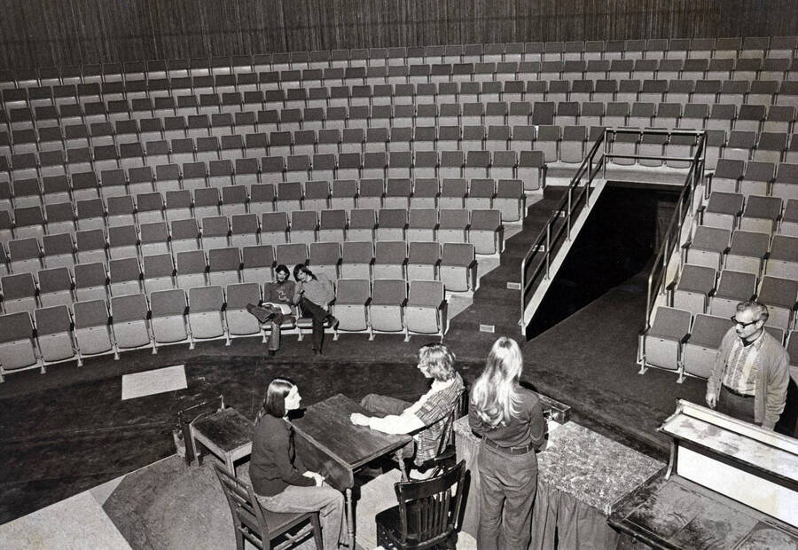 1975 photograph of Hartung Theatre. Students rehearse a play. [PG1_145-15a]