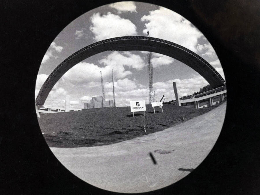 1975 photograph of the Kibbie-ASUI Activity Center under construction. A fish-eye view of the construction site. [PG1_147-13]