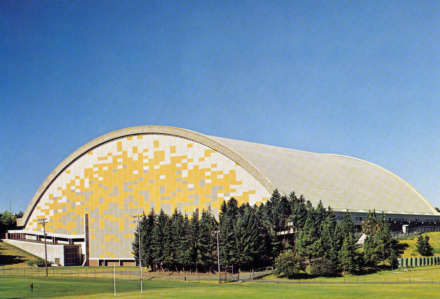 1976 photograph of the Kibbie-ASUI Activity Center. Caption reads: 'Barrel arch roof of the University of Idaho Activity Center, the Outstanding Structural Engineering Achievement. Awarded in a National Competition 1976 by the American Society of Civil Engineers.' Donor: U of I Alumni Office. [PG1_147-32]