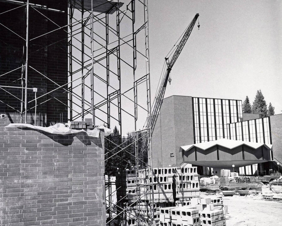 1969 photograph of the Physical Education Building under construction. Education building in background. [PG1_157-06]