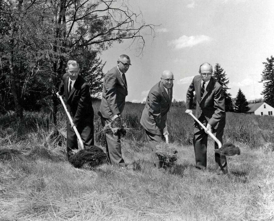 1962 photograph of the Forestry Sciences Laboratory groundbreaking ceremony. Left to right: James W. Kimmey, Ernest Wohletz, D.R. Theophilus, Reed Bailey. [PG1_158-04]