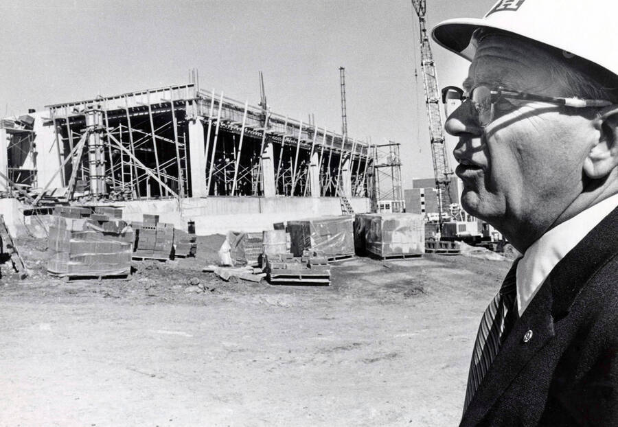 September 15, 1972 photograph of the Menard Law Building under construction. A.R. Menard in foreground. [PG1_162-15]